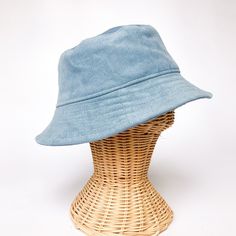 "The perfect bucket sun hat for women,men, babies and kids! Made from 100% cotton sky blue corduroy makes this hat very comfortable to wear. I made this hat with a day of adventure in mind, somewhere sunny and wild! This hat is made from a sky blue 100% cotton corduroy fabric. Inside liner is white cotton. All baby and child sizes come with chin straps. Brim measures approx. 2.5\" wide. Crown measures approx. 3.5\" deep. Available in sizes: 0-3 mos. - 12\" to 14\" head circumference 3-6 mos. - 1 Toddler Bucket Hat, Baby Summer Hat, Beach Bucket Hat, Blue Bucket Hat, Corduroy Bucket Hat, Floppy Beach Hat, Summer Hats Beach, Corduroy Hat, Bucket Hat Women