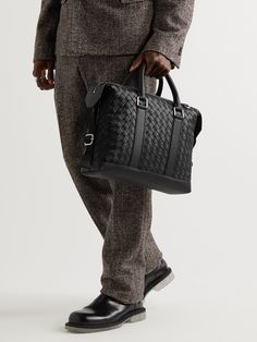 Bottega Veneta's briefcase is made from water-resistant 'Hydrology' leather and has been handcrafted in Italy in a large-scale version of the brand's signature intrecciato technique. It features two top handles and a detachable strap. Bottega Veneta Intrecciato Bag, Leather Briefcase Men, New Bottega, Latest Bags, Bottega Veneta Intrecciato, Hat Men, Briefcase For Men, Leather Briefcase, Leather Pouch