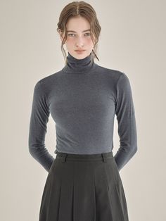 Editor's Notes Basic andessential turtleneck top that made of stretchy and soft fabric. Featuring theslim silhouette and comfortable texture that fit everybody no matter the size.You can layer on top of the shirts, sweater, or vest to complete the classicand casual outfits. - Turtleneckdesign- Slimsilhouette- Soft andstretchy fabric- Essentialitem for winter Measurements(in.)ONE SIZE (XS-M)- Shoulder: 14.56 in- Chest: 15.55in- Sleeve length:26.37 in- Sleeve width:3.74 in- Total le Khaki Turtleneck Outfit, High Stretch Gray Tops For Winter, High Stretch Gray Top For Winter, Casual Mock Neck Top In Solid Color, Casual Mock Neck Top, Slim Fit High Neck Winter Tops, Winter Slim Fit High Neck Tops, Winter High Neck Slim Fit Tops, Slim Fit Turtleneck Tops For Fall