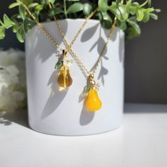 Material: Our large pears necklaces are made with glass pears and 14K gold plated necklace chain which is hypoallergenic. Size: the pendant is about 0.5" x 1.1" Handmade Pear-shaped Gold Necklace, Handmade Pear-shaped Necklace Gift, Handmade Pear-shaped Necklace For Gift, Yellow Teardrop Necklace For Gifts, Glass Teardrop Pendant Necklace For Gift, Yellow Gold Glass Necklaces As Gift, Yellow Gold Necklaces With Glass For Gift, Yellow Gold Glass Necklace As Gift, Gold Pear-shaped Drop Necklace For Gift