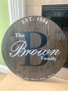 a wooden sign that says the b is for boozen family on it's side