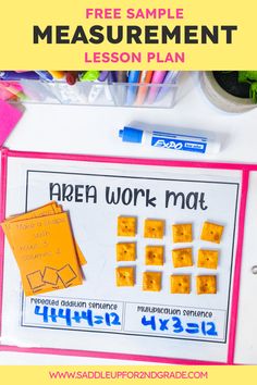 an area work mat is shown with markers and pencils