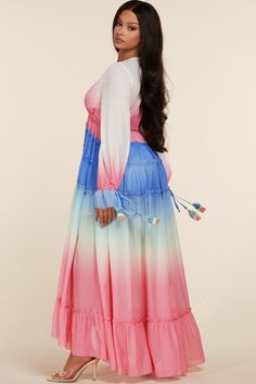 Float into the party with total elegance in this colorful chiffon maxi dress, fashioned with ruffle trim detailing and long bell sleeves. • Deep V-Neck• Ruffled Trim Detail• Tiered Flow-y Skirt• Long Sleeves• Cinched Wrists