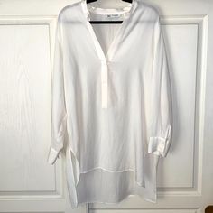 Cute Mandarin Collar Tunic Top. V-Neck And One Button. Length In The Front Is 32 1/2” Length In The Back Is 35”.,P-P 46”, Sleeves 22 1/4” Long. Polyester/Llyocell, Machine Washable. Nwot White V-neck Blouse For Layering, Chic V-neck Tunic For Spring, Chic V-neck Blouse For Layering, Elegant Daywear Blouse With Split Neck, Casual V-neck Blouse For Layering, Chic Daywear Tops With Split Neck, Casual V-neck Tunic For Brunch, Chic Split Neck Blouse For Daywear, Spring Chic Blouse With Henley Neckline