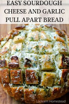 an easy cheesy and garlic pull apart bread on a cutting board with text overlay