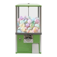 a green and white machine with lots of balls in it's display case on a white background