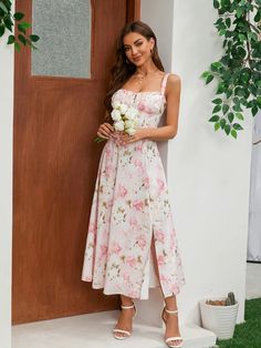 You'll feel ultra feminine in our Carmen Pink Peony Print Cotton Bustier Sundress, which is the perfect fit for Spring and Summer garden parties. It's cut from stretch cotton-rich fabric in a gorgeous vintage print and has a corseted bodice to cinch the fit with a beautiful lace-up back. The gathered bust has a drawstring tie and the side split adds a little sexiness to reveal a flash of leg. It's fully lined for comfort and zips to the side for easy on. Wear yours with delicate mid-heels in whi Fitted Sundress With Sweetheart Neckline For Garden Party, Sleeveless Fitted Midi Dress With Rose Print, Fitted Sleeveless Rose Print Midi Dress, Fitted Sleeveless Midi Dress With Rose Print, Fitted Floral Print Midi Dress For Garden Party, Sleeveless Floral Dress With Fitted Bodice For Garden Party, Strapless Floral Print Sundress For Garden Party, Floral Print Dress With Fitted Bodice For Garden Party, Strapless Floral Sundress For Garden Party