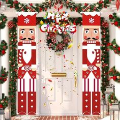 two nutcrackers are standing in front of a door decorated with christmas decorations