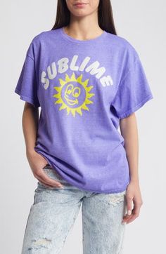 The '90s SoCal style shines through on this oversized Sublime T-shirt that pays homage to the legendary rock band. 27 1/2" length (size Medium) Crewneck Short sleeves 100% cotton Machine wash, tumble dry Imported Summer Purple Tops With Graphic Design, Purple Summer Tops With Graphic Design, 90s Inspired Letter Print T-shirt For Summer, 90s Inspired Summer T-shirt With Letter Print, Oversized Purple T-shirt For Summer, Purple Graphic Design T-shirt For Summer, Summer Purple Graphic Design T-shirt, 90s Inspired Logo Print Summer T-shirt, 90s Inspired Graphic Print T-shirt For Summer