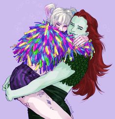 two women hugging each other with colorful feathers on them