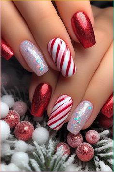 Get festive with these classic red and white candy cane nails featuring a stunning glitter accent! The traditional stripes shine brightly with an eye-catching glitter finish on the accent nails, making your manicure pop while keeping it chic and stylish. Perfect for holiday parties or cozy gatherings, these nails are a sweet way to celebrate the season! 🎄✨💅 #NailArt #CandyCaneNails #GlitterNails #ChristmasNailDesigns #HolidayNailInspo Christmas Nail Glitter Designs, Christmas Nails With Cat Eye, Sparkly Candy Cane Nails, Candy Cane Snowflake Nails, Christmas Nails Candy Cane French Tip, Candy Cain Nail, Christmas Gel Manicure Ideas, Pink And Red Candy Cane Nails