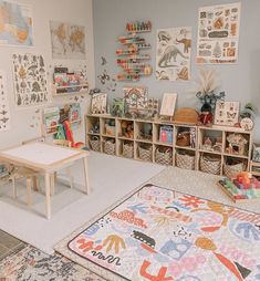 a child's playroom with toys and bookshelves