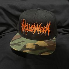 Halloween Metal Black Hat / Camo Bill Snapback Hat Classic Yupoong 64% Acrylic / 16% Wool / 13% Polyester / 7% Cotton Black Under-Bill Super Limited Run North Las Vegas, Black Camo, Black Hat, Snapback Hat, Trucker Cap, Snapback Hats, Las Vegas, Camo, Baseball