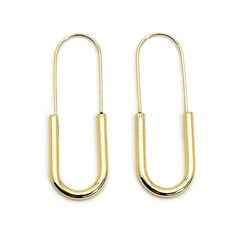 Lightweight and easy to accessorize, these modern and elegant safety pins earrings are crafted in Sterling Silver plated 14k Gold. Metal: Silver 925, 14k Yellow Gold PlatedDimensions: approx. 1/8" depth x 1/2" width x 1.5" heightHypoallergenic and antimicrobialNickel-free and lead-free Pins Earrings, Large Safety Pin, Modern Punk, Pin Earrings, Safety Pin Earrings, Safety Pins, Punk Jewelry, Safety Pin, Silver 925