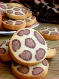 some cookies with chocolate hearts on them sitting on a table