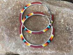 Red with Native Colors Beaded 2 inch Hoop Earrings by DoubleACreations on Etsy Red Colorful Beads Hoop Earrings, Red Beaded Round Hoop Earrings, Red Hoop Earrings With Colorful Beads, Adjustable Red Hoop Earrings With Dangling Beads, Red Beaded Hoop Jewelry, Red Hoop Earrings With Colorful Beads For Jewelry Making, Red Hoop Jewelry With Colorful Beads, Black Hoops Earrings, Beautiful Beadwork