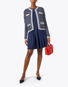 Weill's Suzann jacket is sure to be a staple in your wardrobe for years to come. Featured in a classic navy and white striped motif, it's designed with double patch pockets and a chic gold button closure, making it the perfect finishing touch to any ensemble. Layer it over sleek separates or dresses alike for an instantly polished look. Elegant Striped Outerwear With Pockets, Chic Striped Outerwear With Pockets, Classic Outerwear With Contrast Stripes For Work, Chic Striped Outerwear With Button Closure, Skirt And Top Dress, Work Accessories, Striped Jacket, Polished Look, Skirt Top