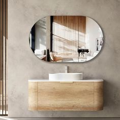 a bathroom with a sink and mirror on the wall