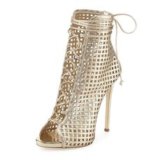 Step into luxury with our Champagne Stiletto Heel Peep Toe Lace Up Caged Booties for Women. These glamorous booties feature a chic caged design, perfect for elevating any outfit with style. Handcrafted US sizing. Fits true to size. Heel height: 4.72" / 120 mm approx Product measurements were taken using size 8. Please note that measurements may vary by size. Champagne-colored lace-up caged booties with a stunning peep toe for a chic and sophisticated look. The stiletto heel adds height and allure for a confident stride. Lace-up detailing provides a customized and trendy fit while enhancing the overall aesthetic. Perfect for various occasions, from evenings out to special events. Short Heel Boots, Open Toe Ankle Boots, Cl Fashion, Lace Up Heel Boots, Giuseppe Zanotti Heels, Short Leather Boots, Caged Sandals, Leather Lace Up Boots, Lace Up Booties