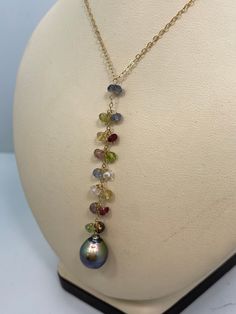 "This is a custom designed drop necklace crafted from 14kt yellow gold. It features a 10mm teardrop silver pearl and 15 natural gemstone faceted beads. It is a 'Y' motif necklace. The chain is 16\" with 2.25in long drop. It weighs 2.5dwt. If you love this necklace, please see the matching earrings in my other listing." Yellow Gold Briolette Gemstone Drop Necklace, Elegant Drop Necklace With Briolette Natural Stones, Elegant Briolette Drop Necklace With Natural Stones, Briolette Gemstone Necklace, Ametrine Ring, Gold Rosary, Vintage Omega, Black Hills Gold, Y Necklace