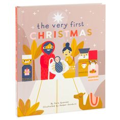 the very first christmas book with an image of two people holding a baby in their arms