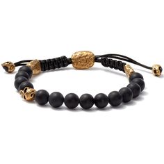 Black onyx beads offset with a single brass skull captures this bracelets powerful impression. Brass hardware and black cord make up the adjustable pull-closure, finished with brass skull anchors for an additional point of difference. Handmade Onyx Black Bracelets, Handmade Black Onyx Bracelets, Modern Black Hand-strung Bracelets, Modern Black Hand-strung Bracelet, Gold Adjustable Skull Bracelets, Adjustable Gold Skull Bracelets, Modern Black Hand-strung Beaded Bracelets, Luxury Adjustable Black Wristband, Luxury Black Jewelry With 8mm Beads