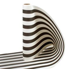 a roll of black and white striped paper