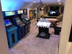 a room that has some arcade machines in it