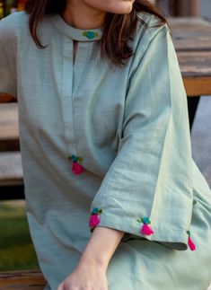 Freshness of mint with hint of hot pink: perfect blend. Simple Sleeve Embroidery Designs, Sleeve Embroidery Designs, Pakistani Suits Casual, Plain Dress Designs, Dress Stitching Ideas, Tassels Fashion Clothing, Pakistani Kurti, Dress Stitching, Pakistani Kurta