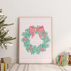 a christmas wreath is hanging on the wall next to presents