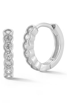 Add essential shine to daytime and evening ensembles in these bezel-set hoop earrings. 1/2" drop Snap-post closure Sterling silver/rhodium plate or 14k-gold plate/cubic zirconia Imported Round Hinged Huggie Earrings For Anniversary, Elegant Adjustable Huggie Earrings For Anniversary, Classic Adjustable Hoop Earrings For Anniversary, Classic Round Huggie Earrings With Sparkling Stones, Elegant Bezel Set Huggie Hoop Earrings, Classic Hoop Earrings With Bezel Setting, Classic Bezel Set Hoop Earrings As Gift, Elegant Round Huggie Earrings With Bezel Setting, Classic Bezel-set Hoop Earrings