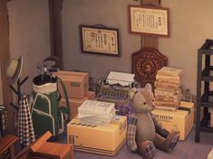 a teddy bear sitting on the floor next to boxes and typewriters in a room