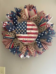 an american flag wreath hanging on the wall