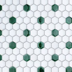 green and white hexagonal tiles on the wall