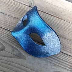 Dazzling starry night theme masquerade Men's Mask in blue highlight shimmer and a splash of silver is a great addition to any Masquerade Themed party, Halloween Costume event or Mardi Gras. This is a bold yet eye catching mask that will a great addition to your costume. All Masks come with either matching Ribbons. Thank you for supporting small businesses and hope our products bring you and loved ones some joy and humor in these trying times. S H I P P I N G - Current processing times range 5-7 Blue Masquerade Mask For Halloween Costume Party, Blue Masks And Prosthetics For Halloween Costume Party, Blue Masquerade Mask For Halloween Party, Blue Venetian Masquerade Mask For Party, Blue Masquerade Mask For Carnival Costume Party, Blue Masquerade Mask For Mardi Gras Costume Party, Blue Masquerade Mask For Halloween, Blue Masks For Carnival Costume Party, Blue Halloween Masquerade Mask