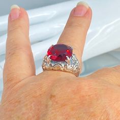 Simulated Red Ruby RingGothic Bling Design#D96 Step into retro-chic fashion with a unique and eye-catching piece of jewelry, Gothic Bling D96. This exquisite Edwardian reproduction ring is crafted with love from premium sterling silver and a simulated Ruby Red gemstone solitaire that will make a bold statement wherever you are. The 10mm wide full cut round gem sits atop the distinctive filigree design that gives the ring an extra edge and ensures it stands out even more against its rivals. Wheth Unique Rings For Valentine's Day, Vintage Red Rings For Valentine's Day, Ruby Rings For Party, Party Ruby Ring With Round Shape, Round Red Ruby Party Ring, Red Crystal Party Ring, Vintage Red Ruby Ring For Valentine's Day, Red Ruby Filigree Ring Gift, Red Ruby Filigree Ring