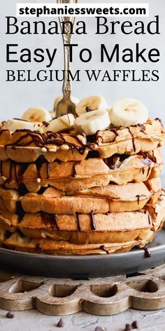 a stack of pancakes with bananas on top and syrup drizzled over them