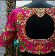 Size  Small      32-34 Medium 34-36 Large     38-40 Xl             40-42 XXL.        44-46 Product Details  Maggam work on Blue Rawsilk blouse  ( can be customized in other colours)  with all over hand embroidery , beads , stones , zardozi , resham in gold and detailing on front and back. Heavy back aari work blouse.  🧵Front: Deep neck with all around embroidery. Front open hooks.. 🧵Closure: Deep back neck with back tie up detailing.  🧵Can be mixed matched with a wide range of sarees 🧵Size refers to circumference around the fullest part of the bust 🧵Estimated Dispatch time: 7 to 15 working days. Contact us if it's an urgent order. Wedding Blouses, Embroidery Custom, Raw Silk Blouse, Zardosi Embroidery, Blouses Designs, Sari Design, Saree Bollywood, Clay Designs, Maggam Works