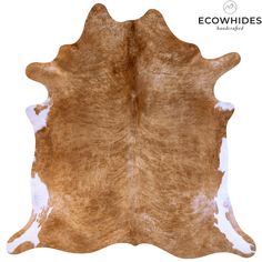 a brown and white cowhide rug on a white background