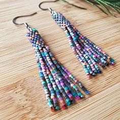 Elegant Multicolor Long Drop Beaded Earrings, Adjustable Iridescent Beaded Earrings, Elegant Multicolor Nickel-free Beaded Earrings, Bohemian Iridescent Beaded Jewelry, Handmade Multicolor Long Drop Jewelry, Multicolor Long Drop Jewelry For Festivals, Iridescent Beaded Jewelry For Festivals, Adjustable Multicolor Earrings With Silver Beads, Adjustable Silver Beaded Earrings With Beaded Chain