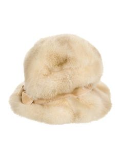 a white fur hat on a white background