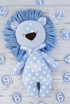 a blue and white stuffed animal with numbers around it