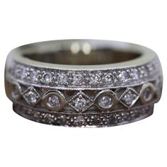 a white gold wedding band with diamonds