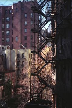 an old fire escape in the middle of a city