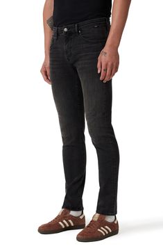 A faded-black wash adds a hint of edge to stretchy, slim-cut jeans that easily work into your casual wardrobe. 14" leg opening; 10 1/2" front rise Zip fly with button closure Five-pocket style 85% cotton, 13% polyester, 2% elastane Machine wash, dry flat Made in Turkey Tailoring Jeans, Cut Jeans, Casual Wardrobe, Slim Fit Jeans, Fit Jeans, Stretch Denim, Nordstrom Rack, Boston, Nordstrom