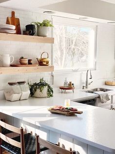 the kitchen counter is clean and ready for us to use in the day or night