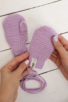 These hand knit mittens on a string are a must-have item for cold weather in autumn and winter. Merino wool mittens will perfectly warm little children's hands during long walks. The mittens are knitted in natural  shades, so they are suitable for any winter clothes for a boy and a girl.  Connected with a string -forget about lost mittens. These Winter gloves can also be a great Christmas gift, Newborn gifts, Coming home outfit. Sizing details: ‣ Message me if you want a fingerless Toddler mittens. ‣ for kids - select the size in the drop down menu according to the age. ‣ 100% merino wool. Care Instructions: hand-wash with natural soap. Do not tumble dry. Important: exact colors may slightly vary, depending on the monitor you are viewing it on. If you are looking for a different size just Handmade Winter Crafts For Gifts, Handmade Crafts For Winter Gifts, Winter Crochet Knitting Pattern For Gift, Winter Gift Crochet Knitting Pattern, Winter Crochet Knitting Pattern, Toddler Mittens, Hand Knit Mittens, Wool Mittens, Winter Gloves