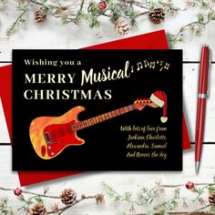 a christmas card with an electric guitar on it