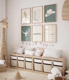 a child's room decorated in neutrals and whites with giraffe art on the wall