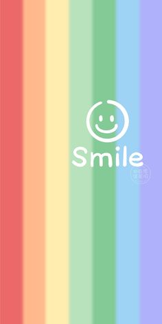 the smile logo is shown on a rainbow striped background